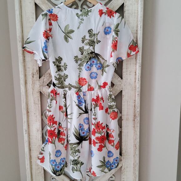 Runway Paris Women's Faux Wrap Surplice Mini A-Line Dress in Floral - Picture 12 of 14